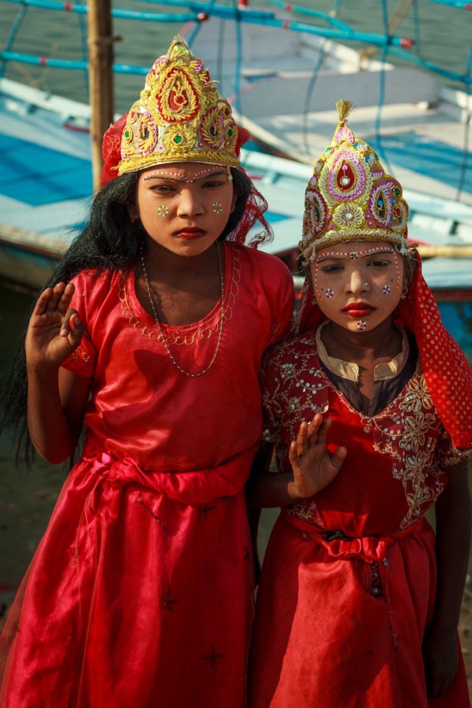 Two girls posing as goddess